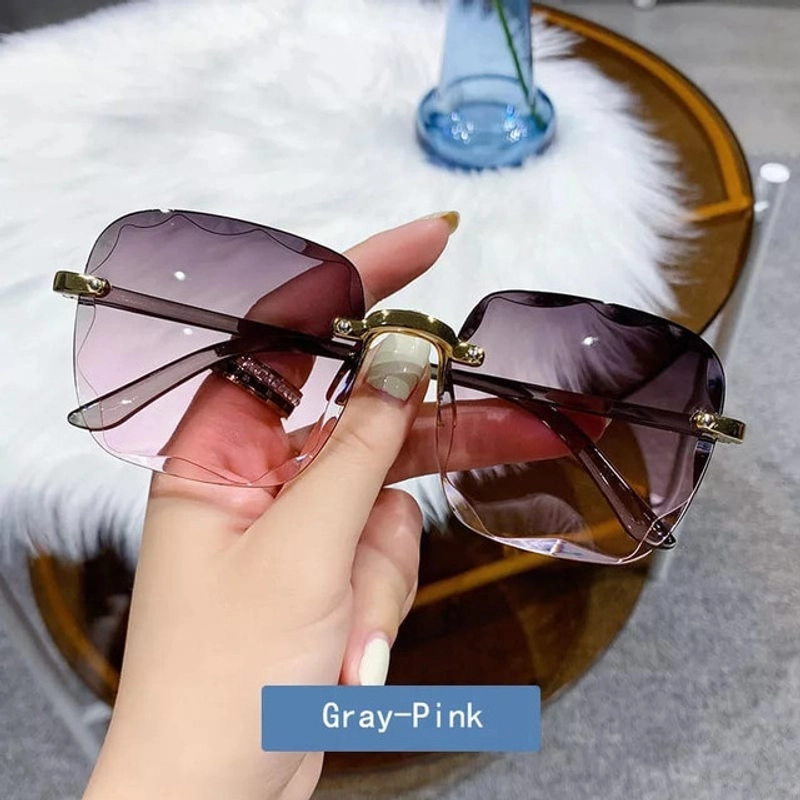 Product image KAHASIL - Kacamata Hitam Wanita Anti Radiasi Fashion Gaya Tanpa Bingkai KMJ250 all variant GRAY PINK